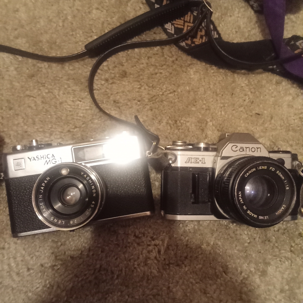 Yashica mg-1 camera and Canon AE-1 Camera